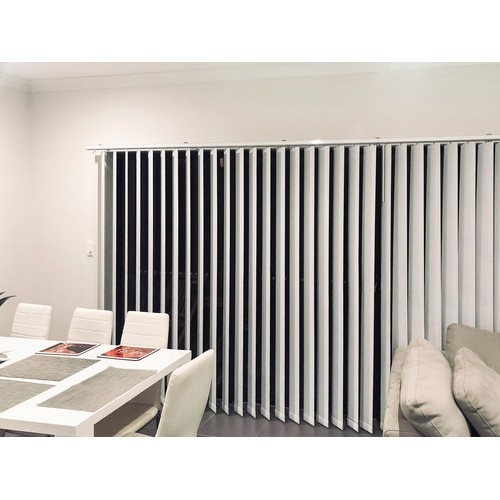 Vertical blinds across a sliding door